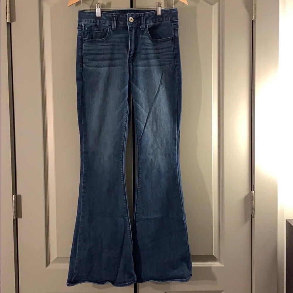 COPY - AEO hi-rise artist stretch flare dark jean…